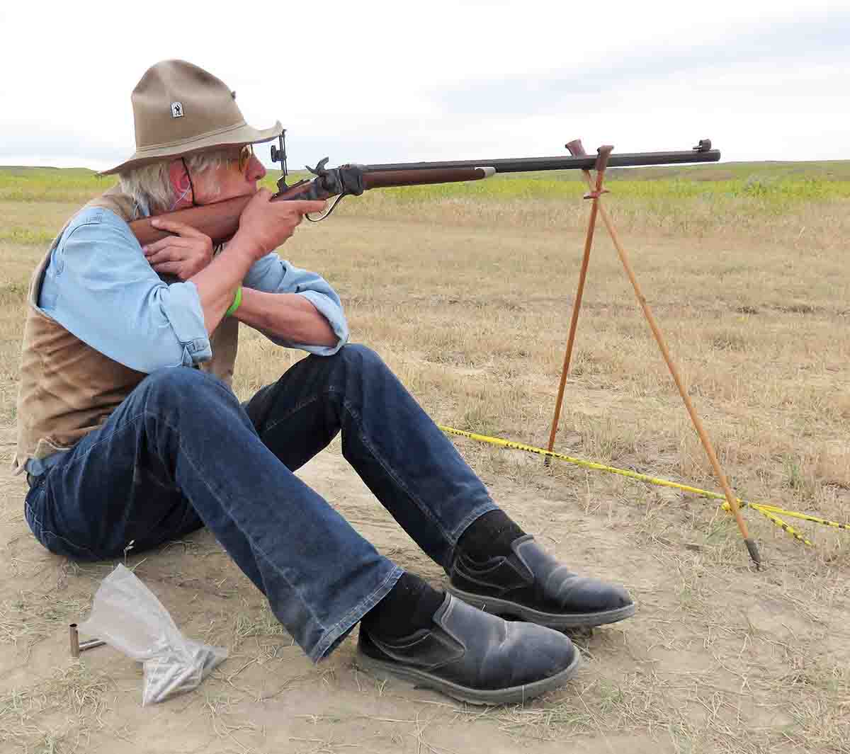 The author’s cross-stick technique at the Quigley match, breaking in the new C. Sharps Arms .44-70 Model 1874.